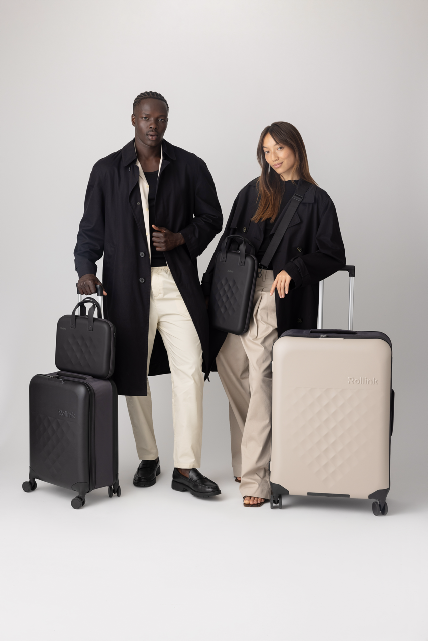 Rollink 360 Spinner foldable suitcase set with laptop cases with man and woman.