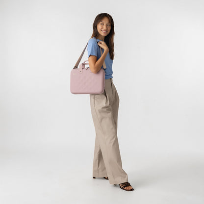 Woman holding Rollink Laptop case tour in lavender 